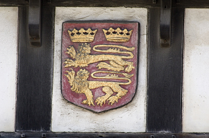 Tudor Gatehouse - exterior - upper half - St. Bart's shield
